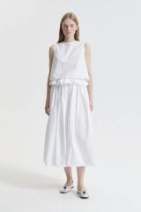 Please help me style this skirt, I haven't worn it yet!