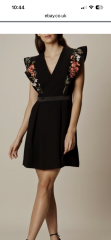 What jacket/wrap with this dress at outdoor wedding?