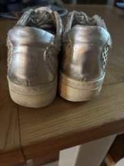 How can I restore yellowed soles on old Daniel trainers?