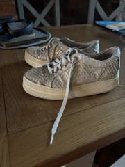 How can I restore yellowed soles on old Daniel trainers?