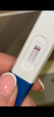 Pregnancy test - positive or dye leaked?
