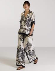 Where can I find a flowing two-piece trouser set on the high street?
