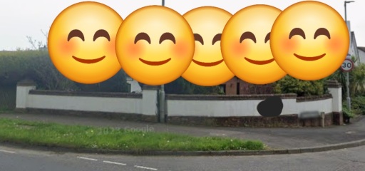 Who is responsible for maintaining wall at entrance to development?