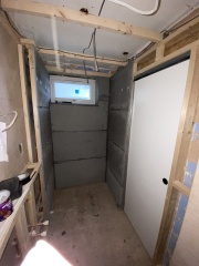 Help! Shower waste level trouble - how to adjust this copper to cast iron junction? (Pics)