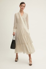 I need a wedding outfit that ticks specific boxes