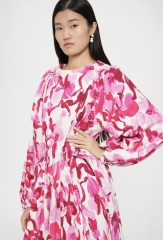 Help me find a cool dress or jumpsuit for a party.