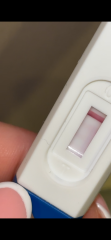 Pregnancy test - positive or dye leaked?