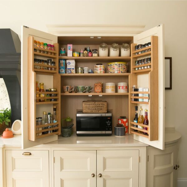 AIBU to think it’s fine to use an air fryer whilst it’s inside of a cupboard?
