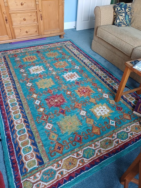 Large patterned blue or green rug recommendations for a living room