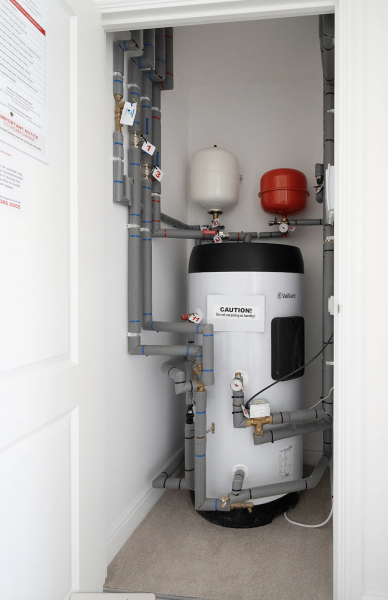 Do you have an air source heat pump tank like this (photo) and should it be making a noise?