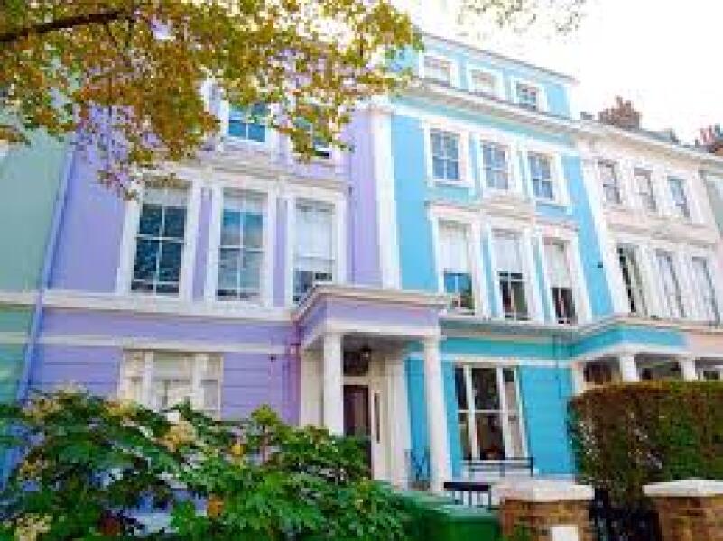 AIBU to ask if I can report my neighbour's bright blue house?