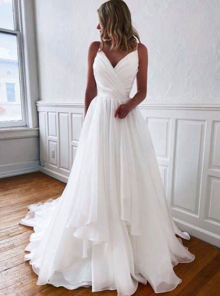 AIBU to wear a floral dress my brother's girlfriend calls white to their wedding? Part 2.
