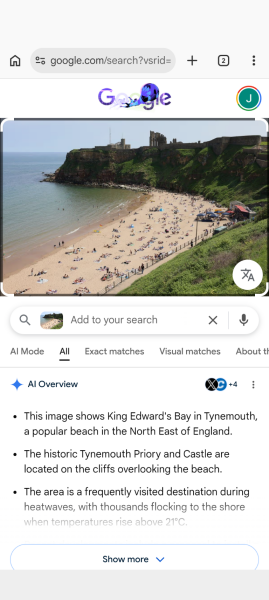 Please help me find the news article about the hot weather with a picture of a lovely looking beach