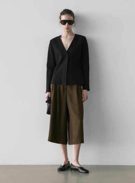Jacket ideas for an apple shape with wide-leg trousers