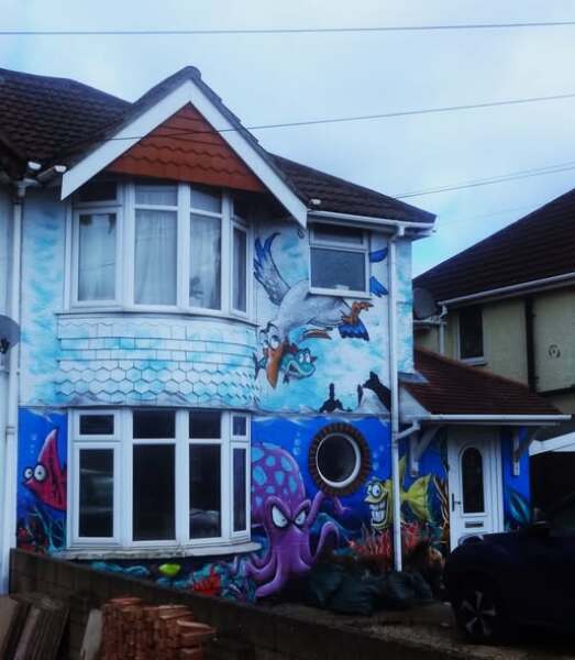 AIBU to ask if I can report my neighbour's bright blue house?