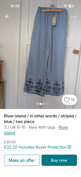 Can anyone identify these blue and white striped trousers label?