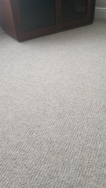 Choosing a large rug colour to go over a beige carpet