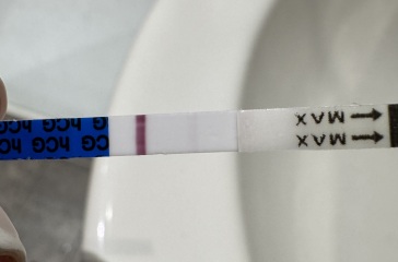 Faint positive pregnancy test five days before period after previous miscarriages