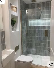 Should we add a little bit of extra warm colour to a white and green themed bathroom? Vote on pics!