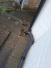 How can I improve drainage on a concrete front area?