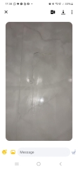 Is my son responsible for shower damage caused by a loose drain cover?
