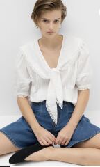 Hello em find a white shirt please!