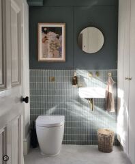 Should we add a little bit of extra warm colour to a white and green themed bathroom? Vote on pics!