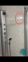 Is my son responsible for shower damage caused by a loose drain cover?