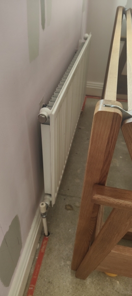 How much gap if putting a sofa bed in front of radiator?