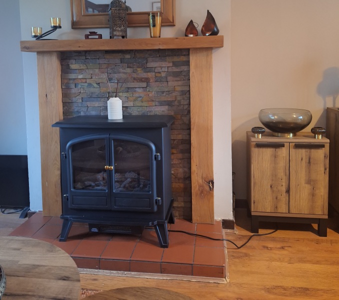 Decorating around a black fireplace