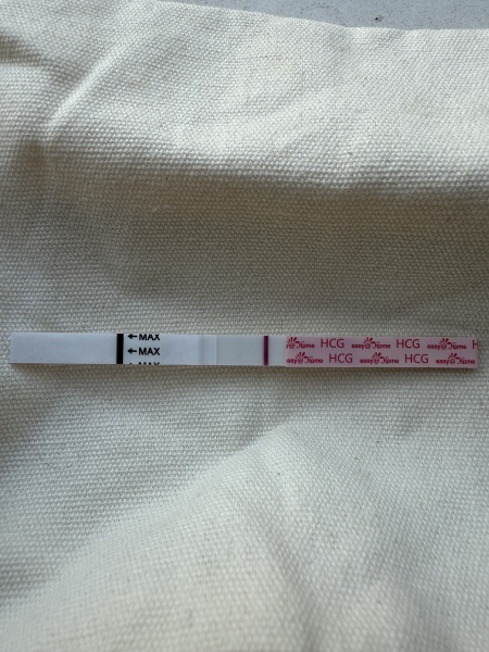 11dpo and unsure if this test shows a faint positive line