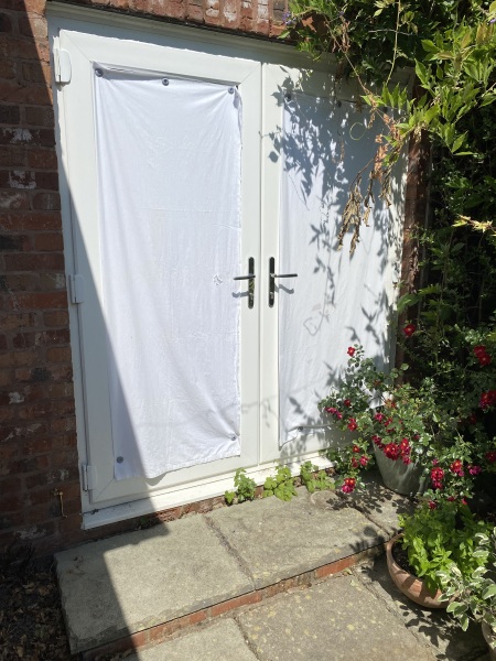 Really quite chuffed with my reusable light-reflecting window covers.