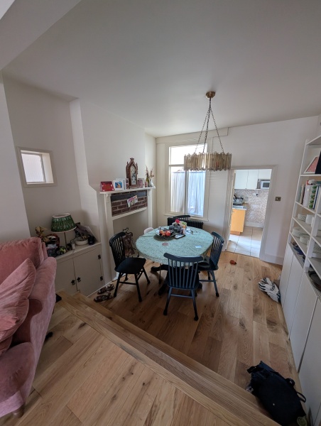 Remove chimney breast and add pony wall/cupboards to improve dining space?