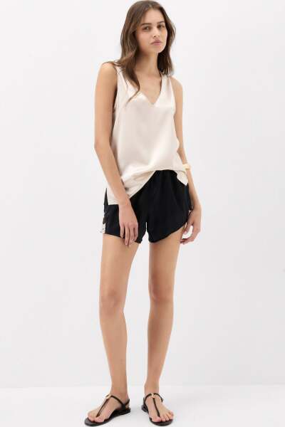 Looking for a satin or silk top and similar trousers