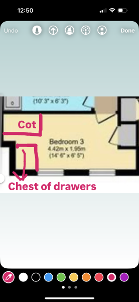 Ideas for arranging an awkwardly shaped nursery with a toddler bed