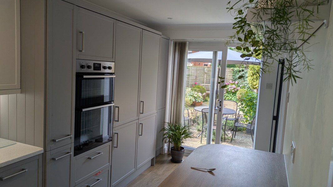 New kitchen and need to tone down the monochrome and warm it up
