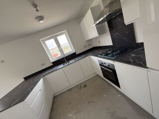 New kitchen and need to tone down the monochrome and warm it up