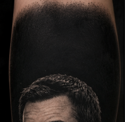 Will a black background portrait tattoo work as a cover-up?