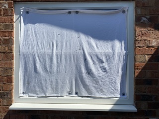 Really quite chuffed with my reusable light-reflecting window covers.