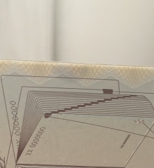 Will a small oil stain on my passport page affect travel?