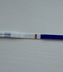 Possible faint positive at 9dpo or just an evaporation line?