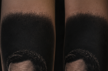 Will a black background portrait tattoo work as a cover-up?