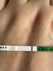 Possible faint positive at 9dpo or just an evaporation line?
