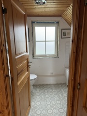 Ideas for renovating awkward bathroom layout with eaves