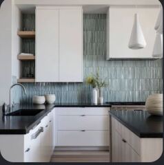 Which worktop colour suits white units, pale wood floor and aqua wall?