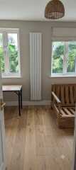 How much gap if putting a sofa bed in front of radiator?
