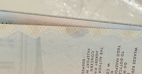 Will a small oil stain on my passport page affect travel?