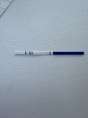 Possible faint positive at 9dpo or just an evaporation line?