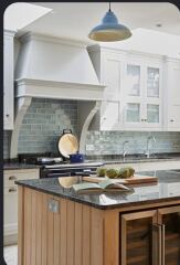 Which worktop colour suits white units, pale wood floor and aqua wall?