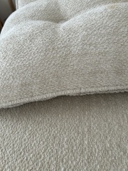 Best way to clean a light bouclé sofa with fixed cushions